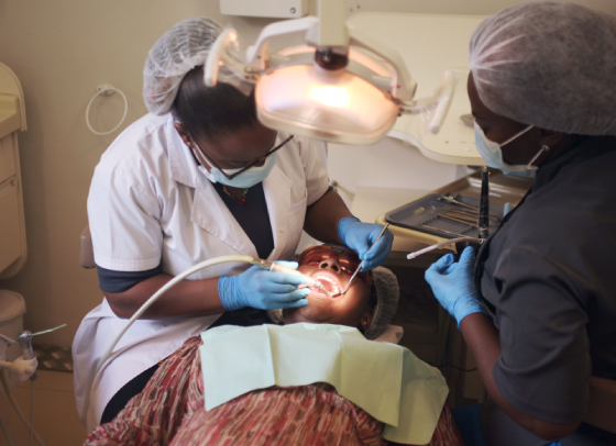 Dentist attending to a patient at Gottel Dental Center